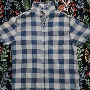 A blue Checkerboard button shirt